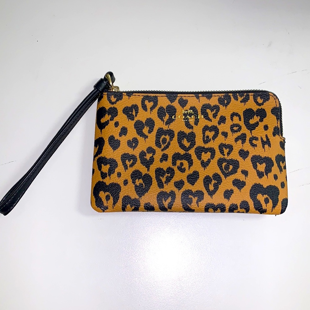 Authentic coach leopard print wristlet.